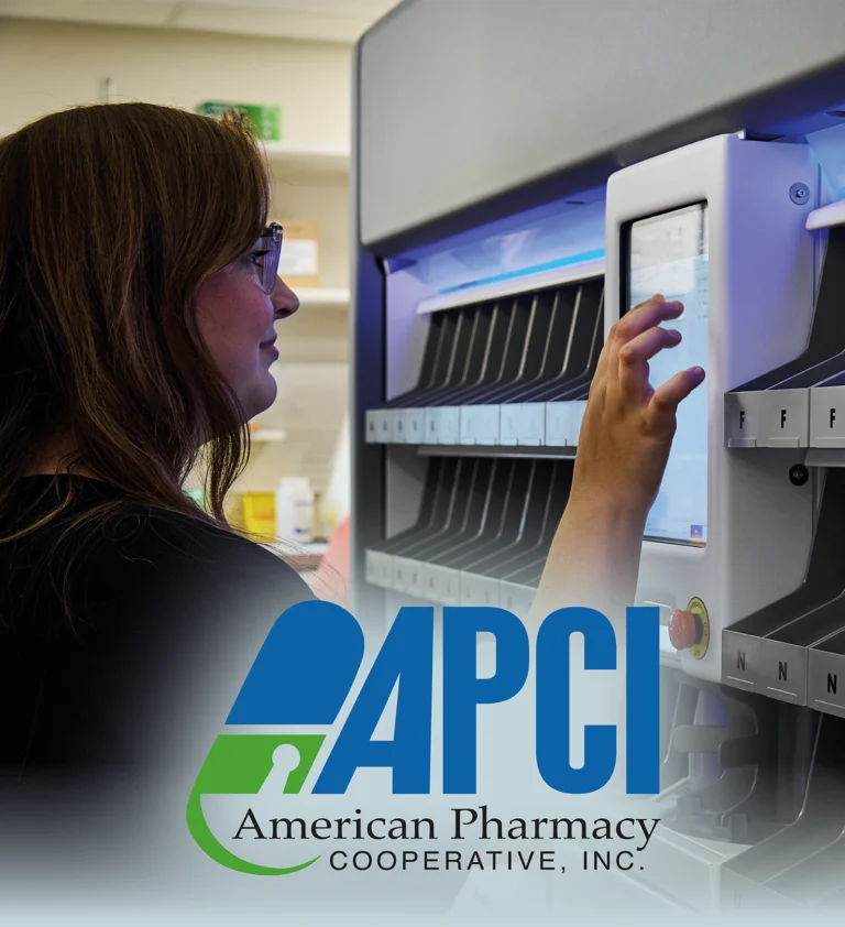 A pharmacy technician at APCI member Whitaker Drugs in Greenville, Ala., operates the pharmacy's automated dispensing system.